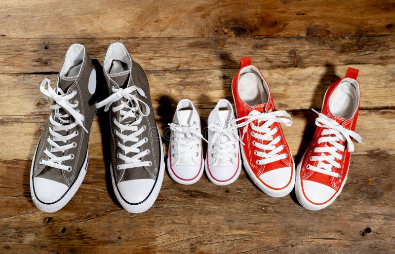 Family Sneakers Canvas Shoes Parents and Child on Wood Floor at Home in ...