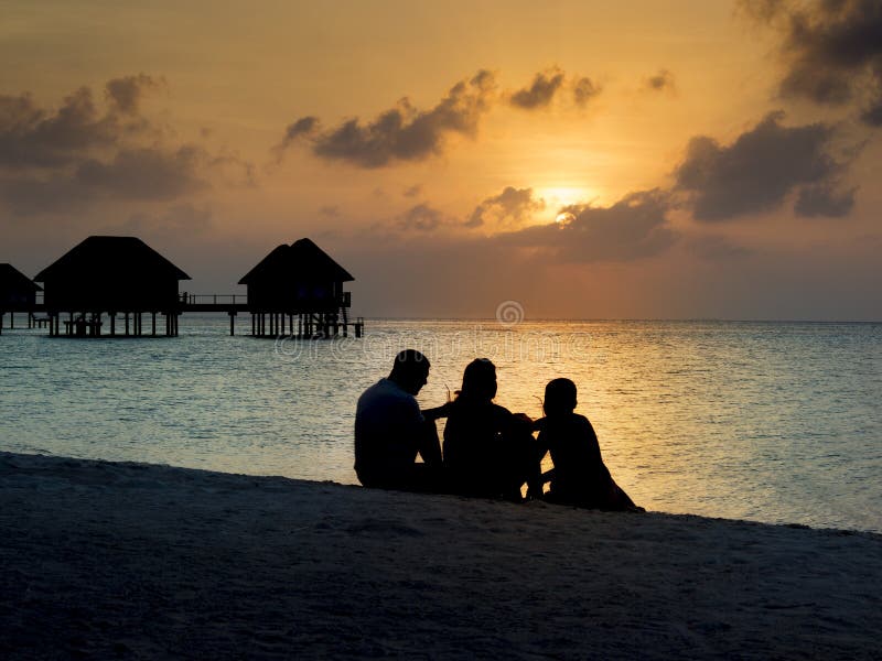 Family at sunset stock photos Family at sunset stock photos