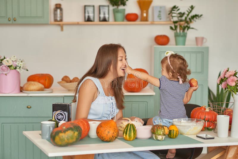 Family Thanksgiving Day.Family in kitchen.Tanksgiving celebration table with traditional festive food. Tanksgiving celebration