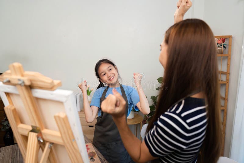 Family time with happy girl celebrating creative moments stock photos