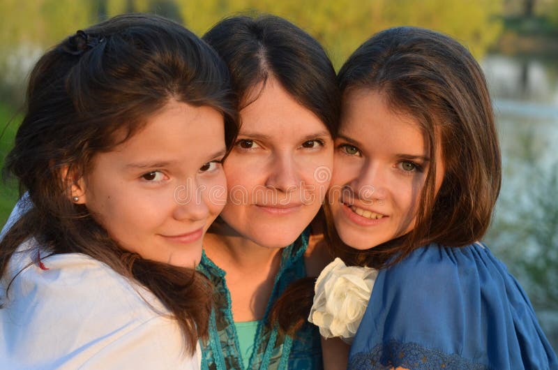 Young mother with her teen daughters. Young mother with her teen daughters