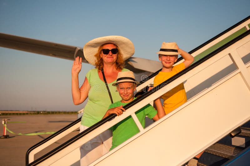 Family traveling by airplane stock photos Family traveling by airplane stock photos