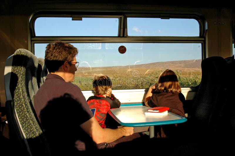 Family travelling on a train