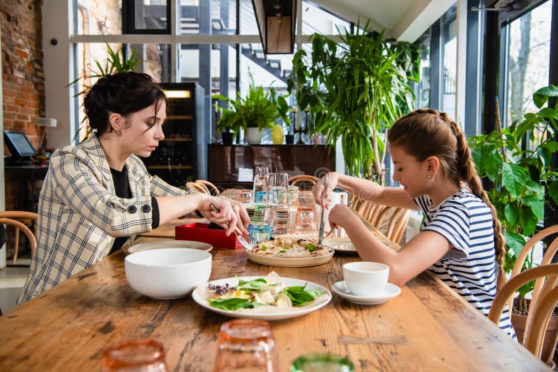 Family of Two Having Lunch at a Cafe Stock Photo Image of happy, food