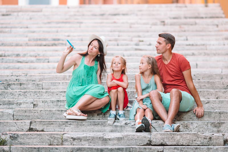 Family vacation in Europe. Airplane in woman hand