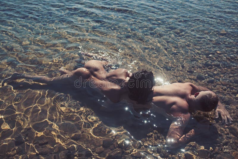 Family and Valentines Day. Couple in Love with Body Relax on Beach hq photo
