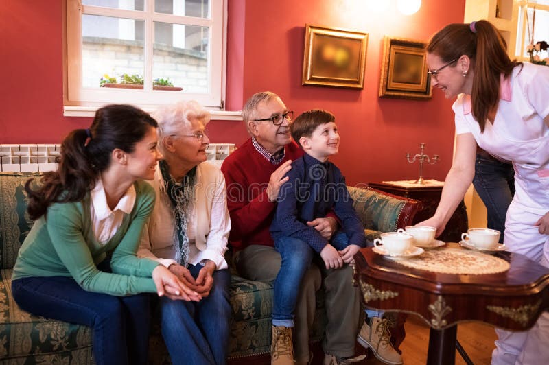 Family visit grandparents at nursing home royalty free stock photos Family visit grandparents at nursing home royalty free stock photos