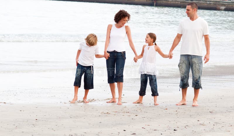 Family walking on a beach