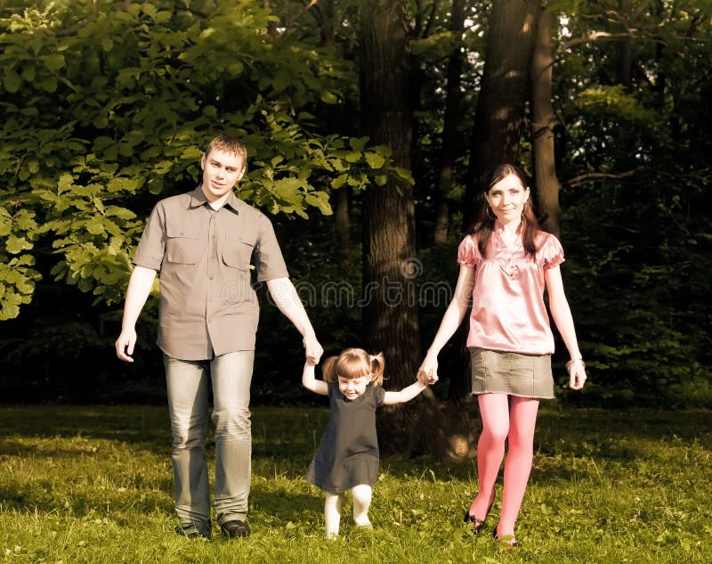 Family Walking In The Park