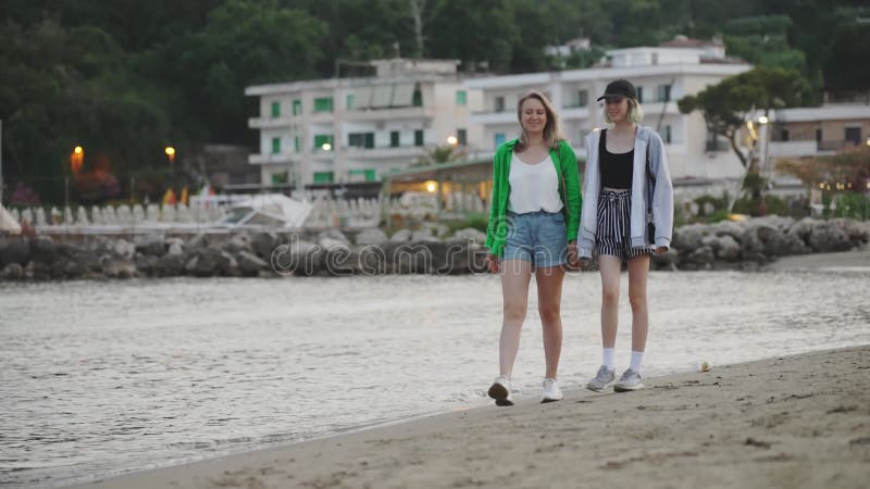 Woman and Her Daughter Enjoying Vacation Stock Footage - Video of chat, shore: 267405982