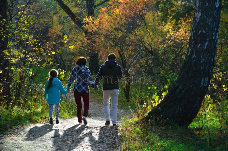 Family walks in autumn forest royalty free stock images Family walks in autumn forest royalty free stock images