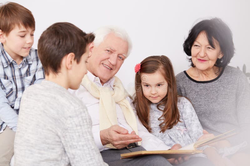 Family watching photo album royalty free stock photos Family watching photo album royalty free stock photos