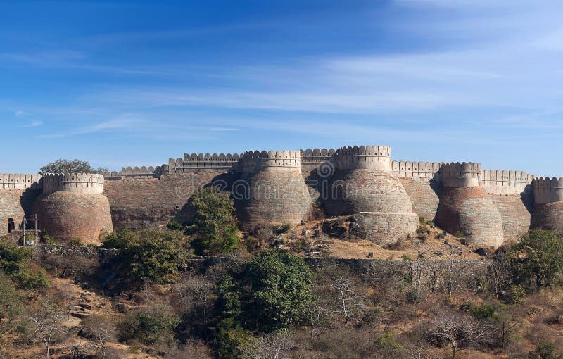 Famous ancient Kumbhalgarh fort in Rajasthan, India. It is a Mewar fortress on the westerly range of Aravalli Hills, in the Rajsamand district near Udaipur. The wall is 38km long. Famous ancient Kumbhalgarh fort in Rajasthan, India. It is a Mewar fortress on the westerly range of Aravalli Hills, in the Rajsamand district near Udaipur. The wall is 38km long