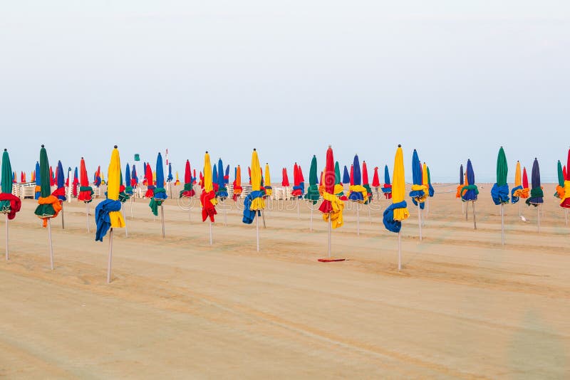 The famous colorful parasols on Deauville beach, Normandy, France stock photo