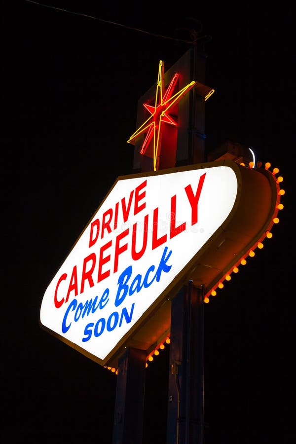 Famous Leaving Las Vegas sign at night stock photo