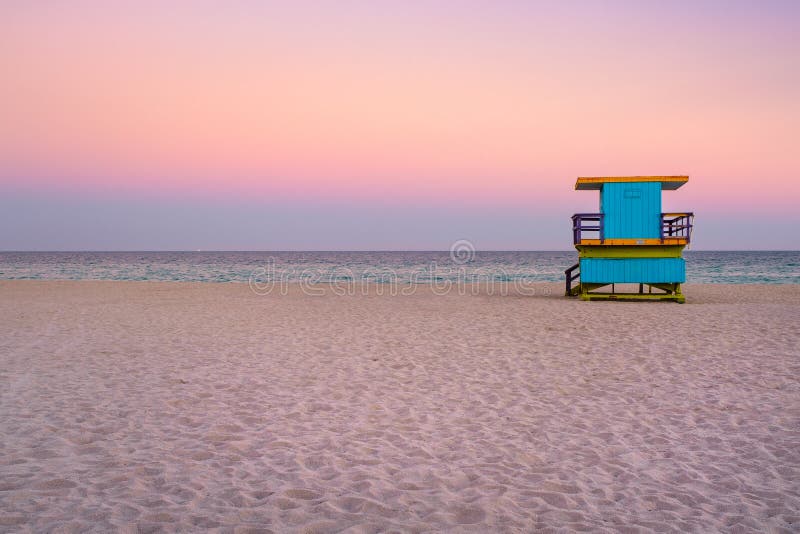 Lifeguard tower at South Beach in Miami with a beautiful sunset sky