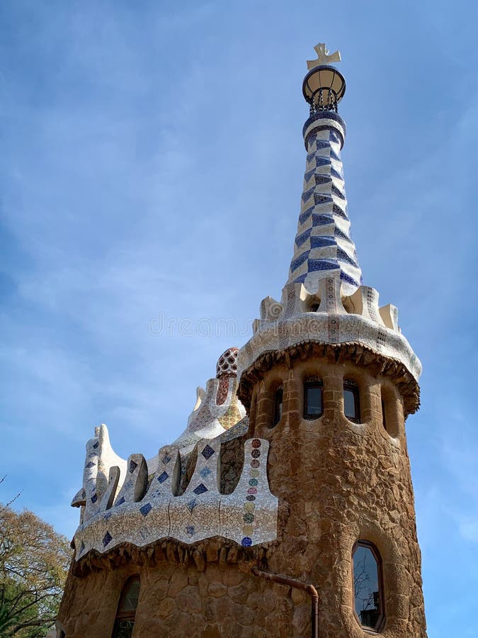 Famous tower at the entrance of the Park GÃ¼ell with remarkable architecture. Designed by Antoni GaudÃ­, Barcelona, Spain