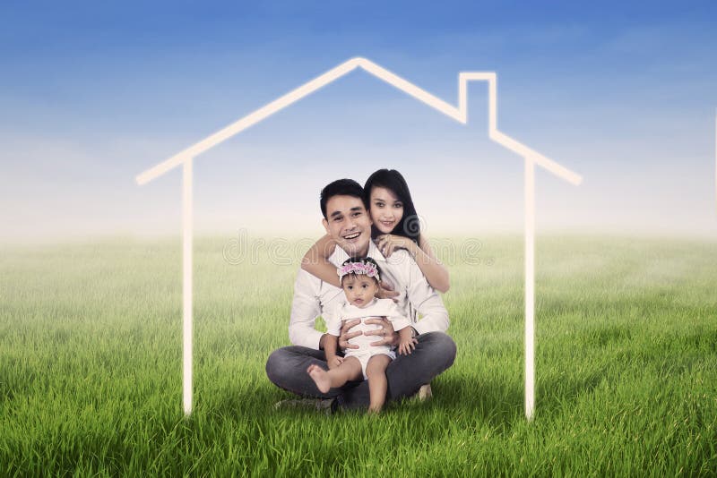 Família feliz que sonha uma casa ilustração stock Família feliz que sonha uma casa ilustração stock