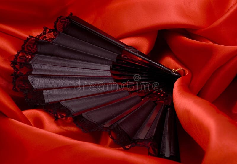 Fan on the red satin