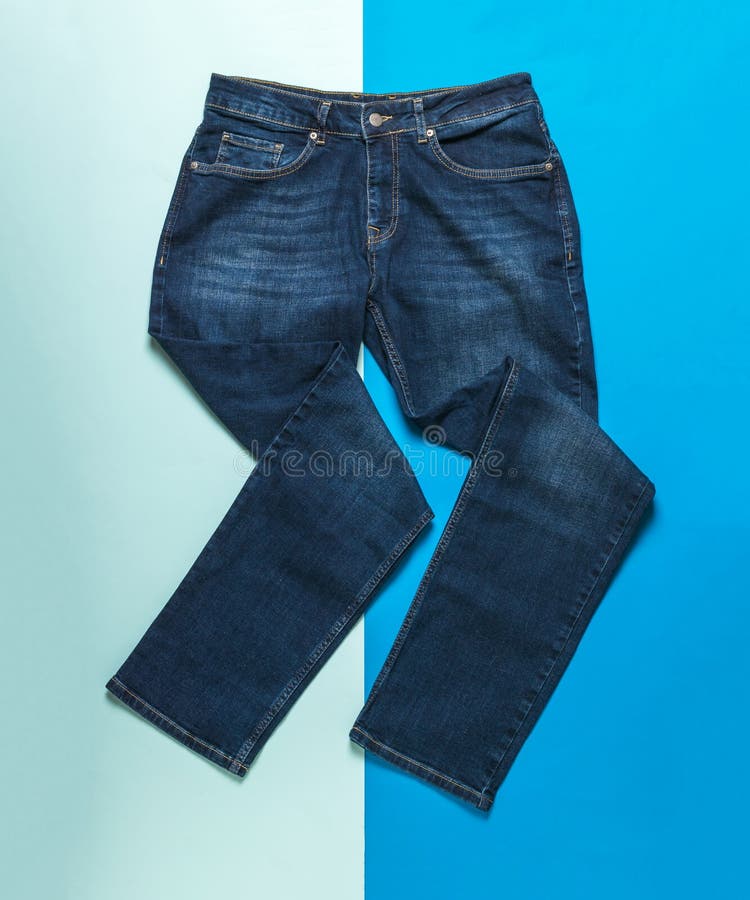 Fancifully Folded Men S Jeans on a Light and Dark Blue Background Stock ...