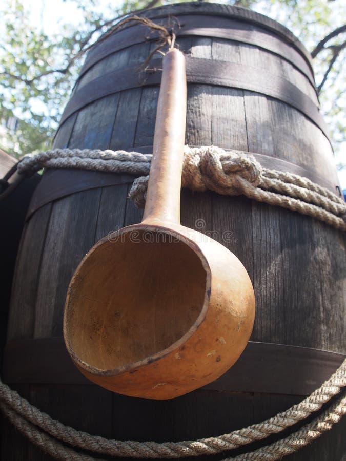 A gourd dipper hangs on an old water bucket at the Briscoe Western Art Museum during their celebration of the National Day of the Cowboy.  San Antonio, Texas. A gourd dipper hangs on an old water bucket at the Briscoe Western Art Museum during their celebration of the National Day of the Cowboy.  San Antonio, Texas