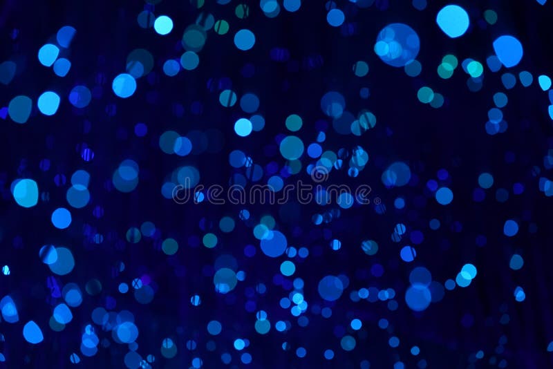 Fantastic blurry and bokeh dark blue theme background in the mystry cave