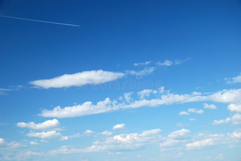 Clear Blue Sky with White Fluffy Clouds. Nature Background Stock Photo ...