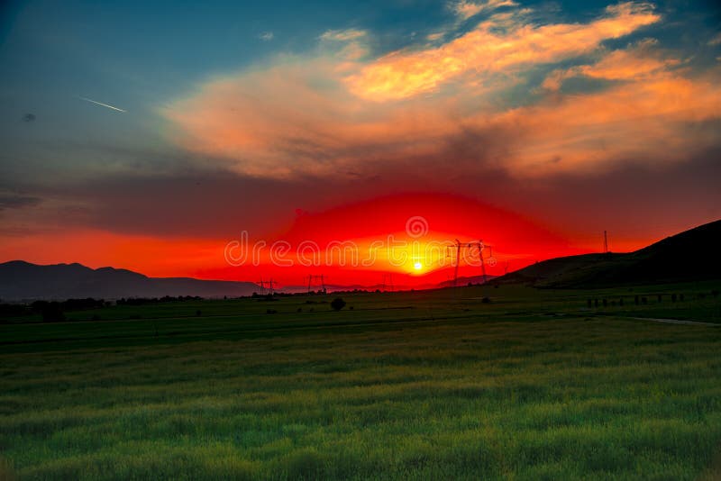 Fantastic sunset clouds in the summer day