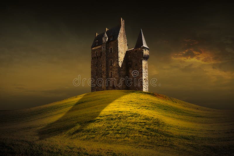 Fantasy castle behind the green grass hill