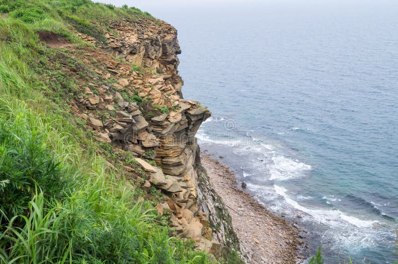 The Far Eastern landscape of one of the picturesque bays of the Russian Island. royalty free stock image The Far Eastern landscape of one of the picturesque bays of the Russian Island. royalty free stock image