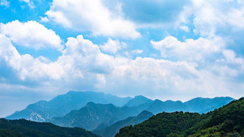 Far View of Mount Tai in Summer Time, with Its Peak Was Surrounded by ...