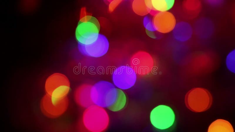 Farbenfrohe, leuchtende Weihnachtsbeleuchtung Hintergrund stock footage