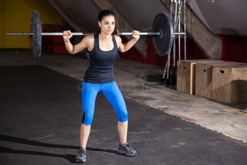 Fare occupa ad una palestra fotografia stock Fare occupa ad una palestra fotografia stock