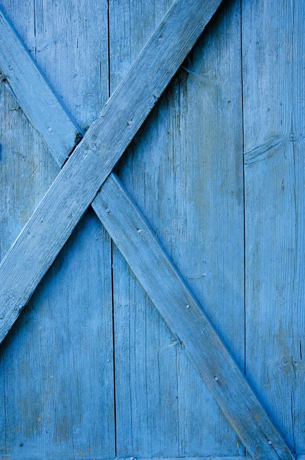 Farm blue painted door wooden background