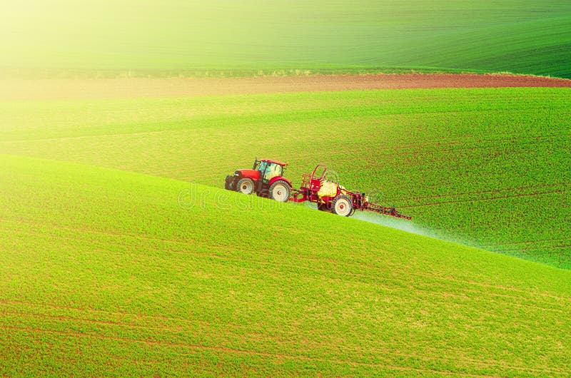 Farm machinery spraying insecticide