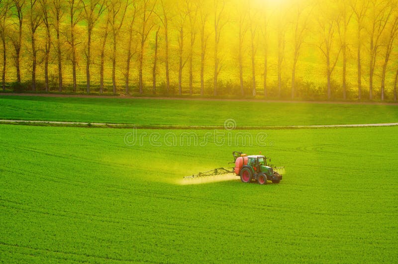 Farm machinery spraying insecticide