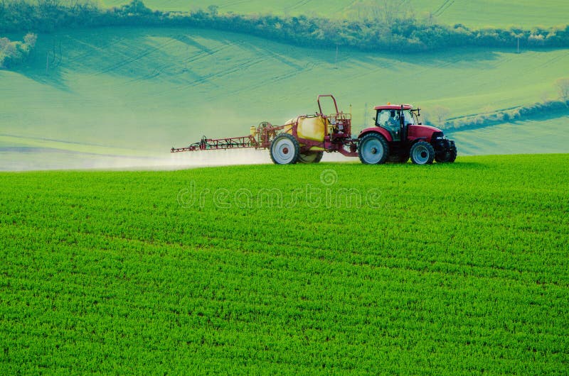 Farm machinery spraying insecticide