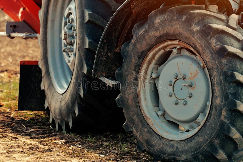 Farm tractor on dirt countryside road royalty free stock photo