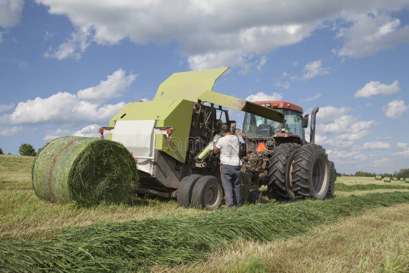 Farmer changing netting