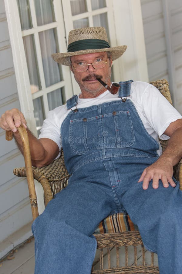 Farmer in Rocking Chair Smoking a Pipe Stock Image Image of farmer