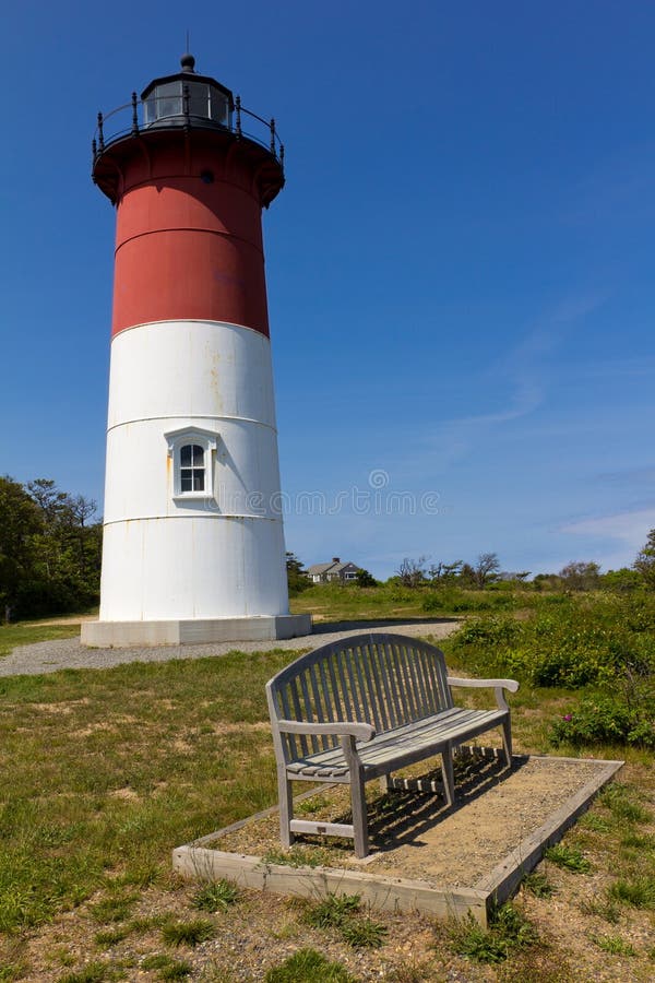 Colorful lighthouse on a sunny summer day. Colorful lighthouse on a sunny summer day.