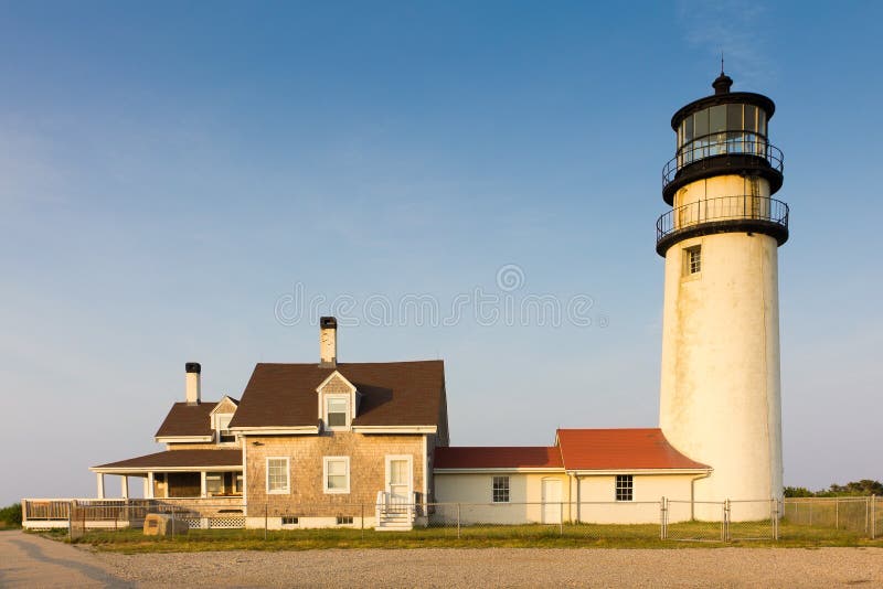 Old lighthouse in Massachusetts bathed in warm light. Old lighthouse in Massachusetts bathed in warm light.