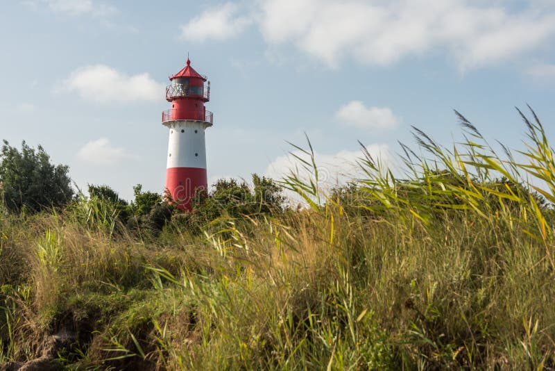 Faro de Falshoeft, mar B?ltico, Schleswig-Holstein, Alemania imágenes de archivo libres de regalías Faro de Falshoeft, mar B?ltico, Schleswig-Holstein, Alemania imágenes de archivo libres de regalías