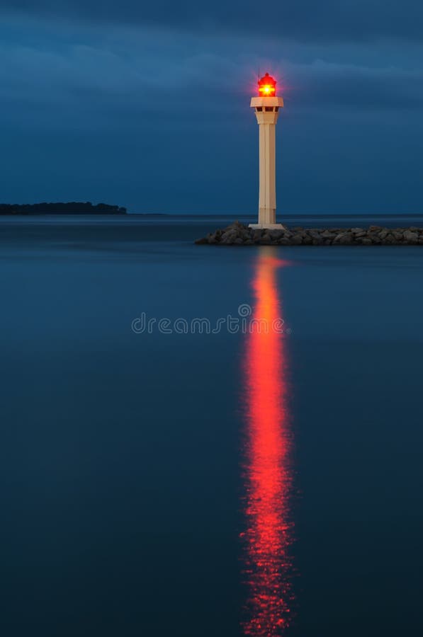 Lighthouse in the Vieux Port of Cannes at night. Lighthouse in the Vieux Port of Cannes at night