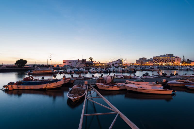 Faro Marina, Algarve, Portugal. Faro - Portugal, April 1, 2018: Night view of the Old Town and the Marina of Faro in Algarve, Portugal stock photography Faro Marina, Algarve, Portugal. Faro - Portugal, April 1, 2018: Night view of the Old Town and the Marina of Faro in Algarve, Portugal stock photography