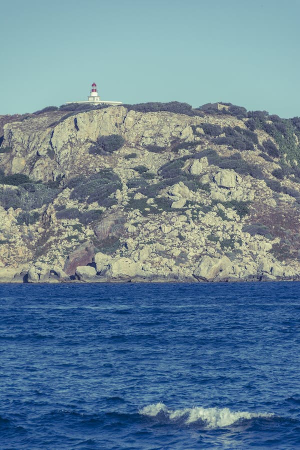 Faro sulle isole di Medes, Girona, Catalogna Immagine d'annata fotografie stock libere da diritti Faro sulle isole di Medes, Girona, Catalogna Immagine d'annata fotografie stock libere da diritti