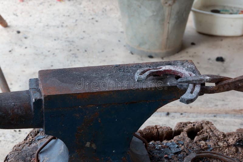 Farrier making horseshoe stock image. Image of mechanic 136658229