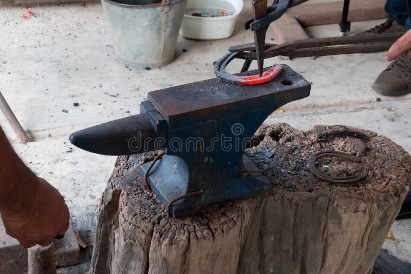 Farrier making horseshoe stock photo. Image of blacksmith 136658168