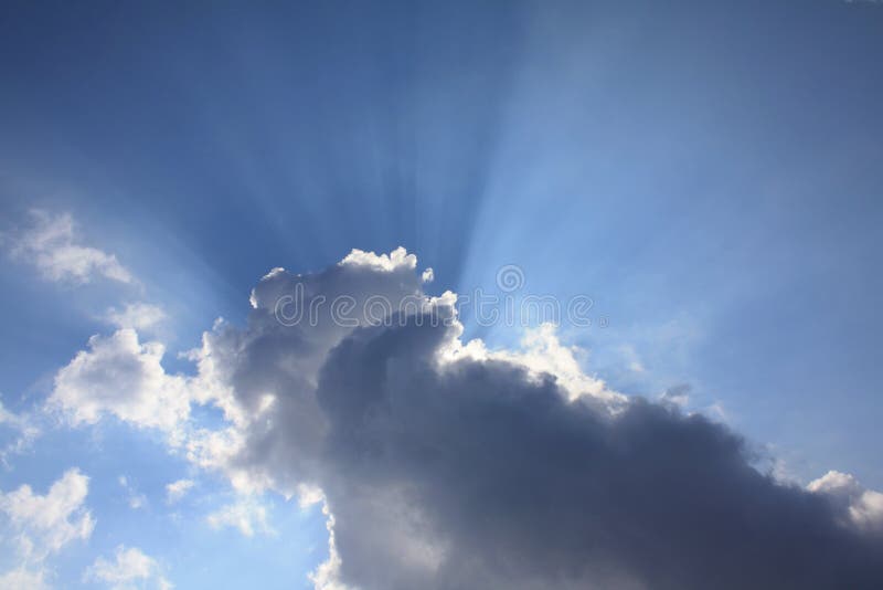 Sun beams behind the cloud. Sun beams behind the cloud.