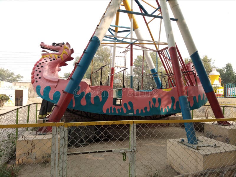 Fascinating dragon ride stock image. Image of park, inflatable 204068767